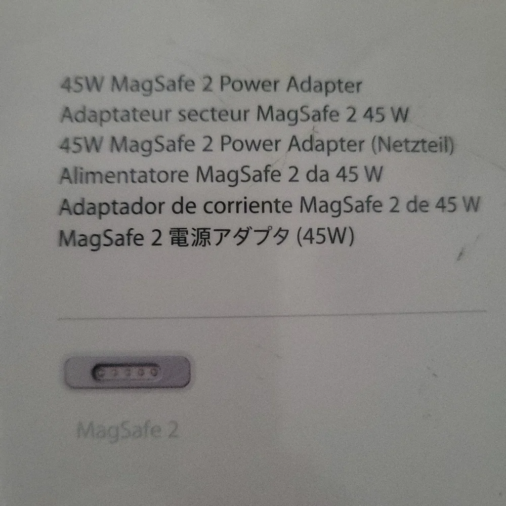 Apple 45W Magsafe 2 power adapter for MacBook Air.